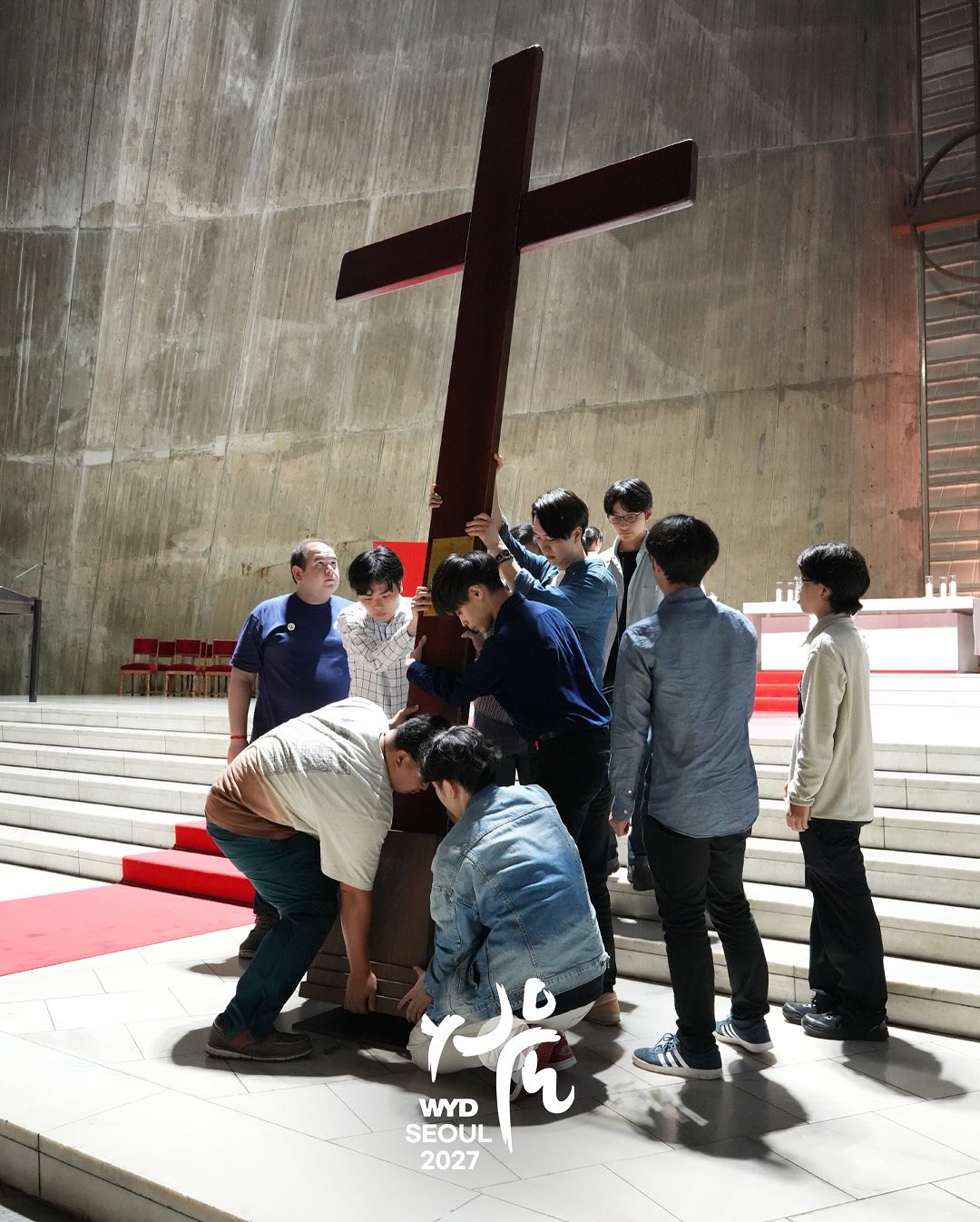 WYD Cross being carried